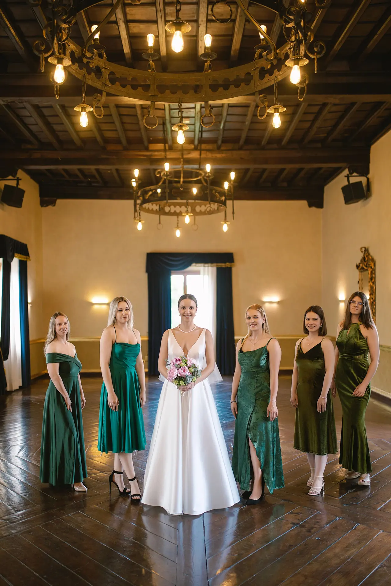 Bride poses with her group. Thinking about how to ask someone to be your bridesmaid.