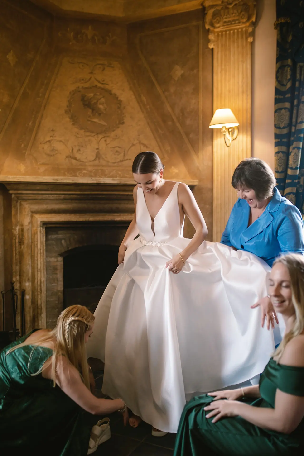 A bride getting ready with her mother and bridesmaids is a classic Italy wedding photo checklist moment.